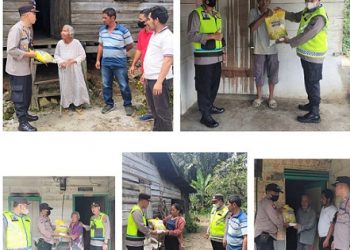 Kapolsek Parapat AKP Jonni Silalahi, SH bersama Kanit Binmas Aiptu L. Naibaho beserta anggota Bhabinkamtibmas menyalurkan sembako ekepada warga terdampak kenaikkan harga BBM.