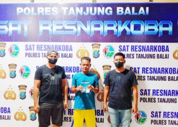 Pelaku H alias Kocu diapit Polisi