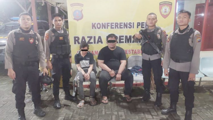 Dua pria yang diamankan tim patroli Sat Samapta Polrestabes Medan dan BKO Samapta Poldasu. (Foto Ist)