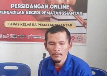 Terdakwa Liharmansyah Saragih saat sidang online dari Lapas Kelas IIA Pematang Siantar