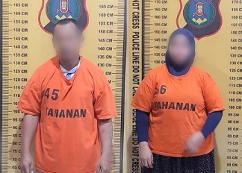 Pasutri YA dan MS Pelaku Penipuan yang sudah ditahan di Mako Polres Simalungun