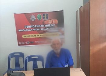 Terdakwa MH saat sidang online dari  Lapas Kelas IIA Pematang Siantar.