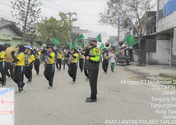 Sat Lantas Polres Tanjungbalai Laksanakan Pengawalan Jalan Santai Peringati Hari Lahir Al-Washliyah Ke 92