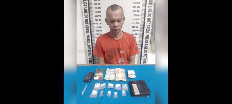 Pelaku Junaidi alias Ucok Tepos dan barang bukti
