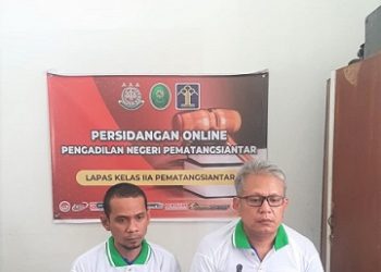 kedua terdakwa, Endy Syawaluddin Silalahi dan MS Hidayat saat sidang online dari Lapas Kelas IIA Pematang Siantar