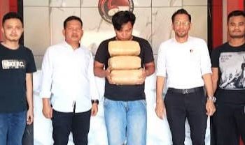Pelaku yang membawa ganja 6 kg diamankan Polres Deli Serdang. (Foto Ist)