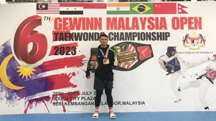 Theo Jeremi Eli Eser Tarigan Pegawai Lapas Tanjung Balai peraih emas pada Gewinn Malaysia Taekwondo Championship