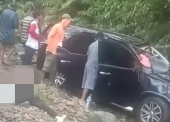 Jasad korban Karina Yusanda Putri dan barang bukti mobil Toyota Fortuner BK 1307 ASK saat masih di TKP