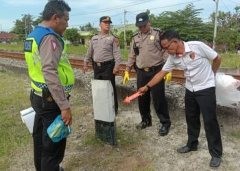 Personil Polres Tebing Tinggi saat olah TKP