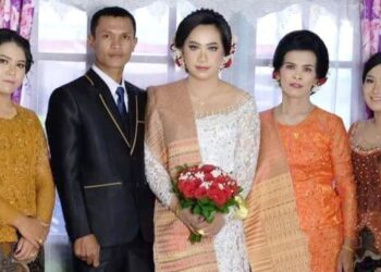 Natalia Nainggolan dan pengantin pria bernama Darman Limbong yang gagal menikah. (Foto Ist)