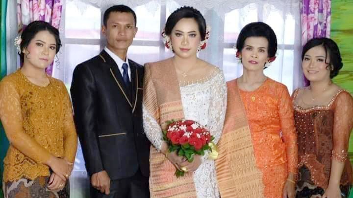 Natalia Nainggolan dan pengantin pria bernama Darman Limbong yang gagal menikah. (Foto Ist)