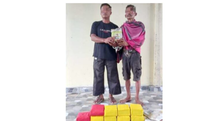 Dua nelayan dari Kabupaten Asahan yang ditangkap polisi karena menyimpan 10 kg shabu di sampan. (Foto Ist)