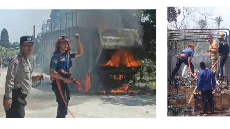 petugas Damkar Siantar saat padamka truk yang terbakar di TKP
