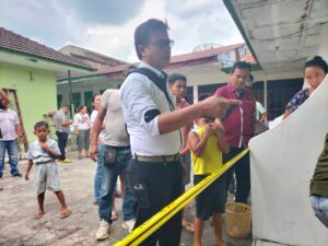 Kanit Jahtanras Sat Reskrim IPDA Sahat Sinaga saat pimpin olah TKP