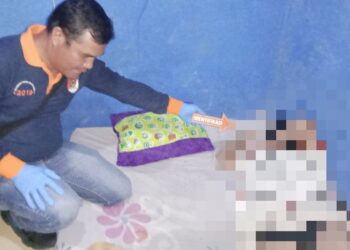 Jasad korban Nia Ramadhani saat ditemukan di kamar kosnya.