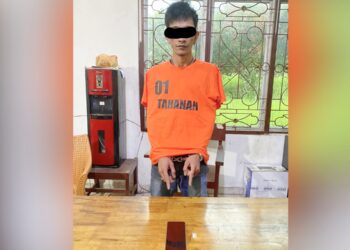 Tersangka TD dan barang bukti