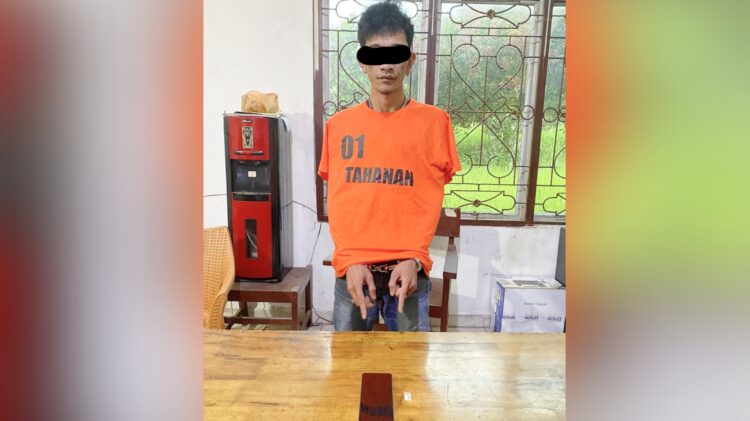 Tersangka TD dan barang bukti