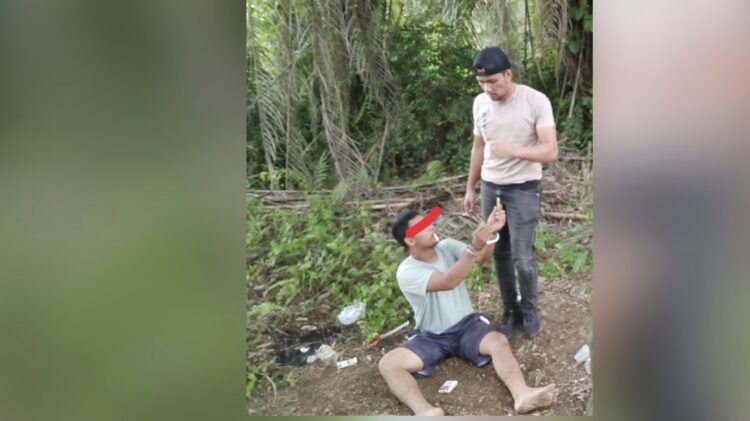 Pelaku Tri Andriansyah Putra dan barang bukti saat ditangkap