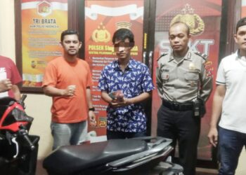 Pelaku KDS alias K diapit Kanit Reskrim IPDA Warman Siallagan SH dan Tim