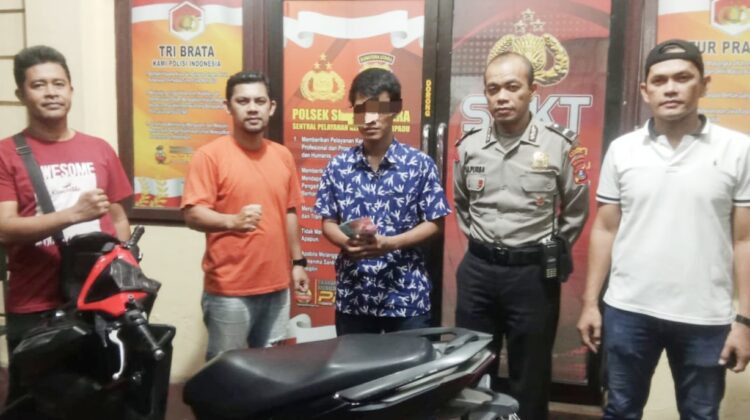 Pelaku KDS alias K diapit Kanit Reskrim IPDA Warman Siallagan SH dan Tim