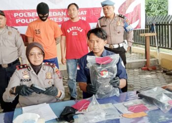 Kapolsek Medan Barat, Kompol Rosa saat paparan atas kasus pengancaman mengunakan pistol. (Foto Ist)