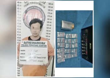 Tersangka Sim dan barang bukti