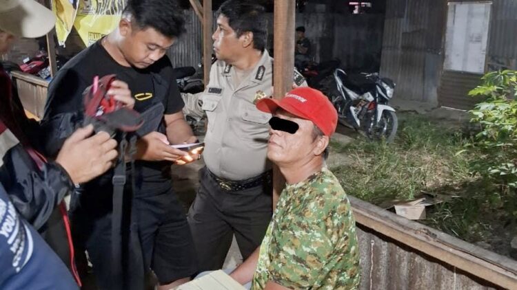 Tersangka Hendra Ridho Join Purba saat ditangkap