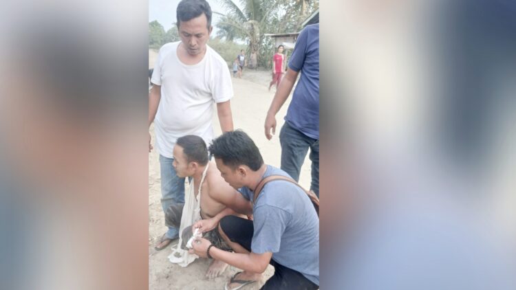 Tersangka W alias Nano saat ditangkap di TKP