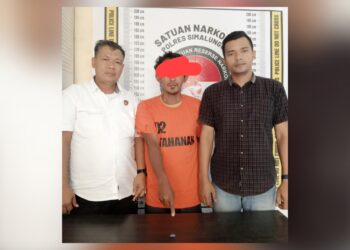 Tersangka Rahmad Doni dan barang bukti