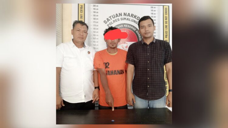 Tersangka Rahmad Doni dan barang bukti
