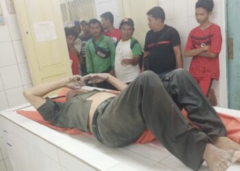 Jenajah Paian Simamora diruangan jenajah RSUD dr Djasamen Saragih