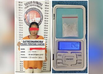 Tersangka IS dan barang bukti