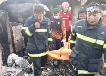 Jenajah korban Surahmansyah saat dievakuasi