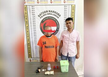 Pelaku Raudin Antonius Sinaga alias Raudin dan barang bukti