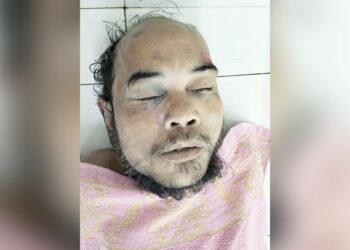 Jenajah pria bertato pedang ditangan kiri