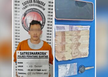Tersangka HBN dan barang bukti