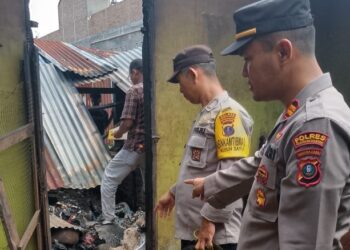 Kapolsek Siantar Timur IPTU Edy J.J. Manalu SH. MH saat pimpin olah TKP