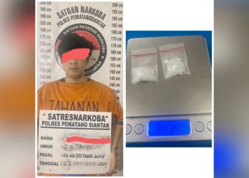 Tersangka RMS dan barang bukti