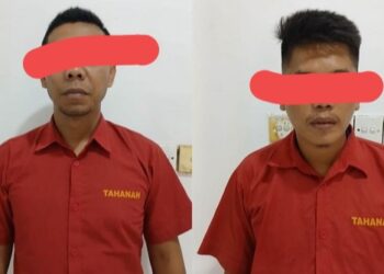 Camat Angkola Sangkunur, Kabupaten Tapanuli Selatan (Tapsel) berinisial DAH dan Kepala Desa (Kades) Tindoan Laut berinisial JS yang terjaring OTT oleh Polda Sumut. (Foto Ist)