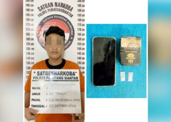 Tersangka S alias Wira dan barang bukti