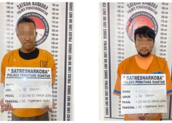 Kedua tersangka, GP dan PP beserta barang bukti