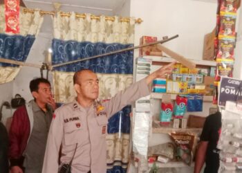Kanit Reskrim IPDA H. Matondang SH saat pimpin olah TKP