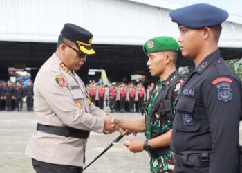 Kapolrestabes Medan Kombes Gidion saat apel pengamanan TPS. (Foto Ist)