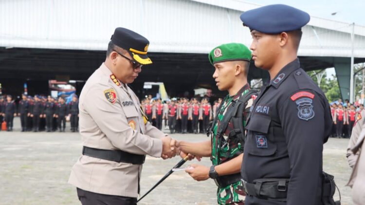 Kapolrestabes Medan Kombes Gidion saat apel pengamanan TPS. (Foto Ist)