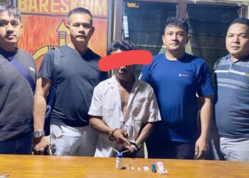 Kapolsek Bosar Maligas IPTU Sonni Silalahi SH bersama Tim mengapit Tersangka Jumino dan barang bukti
