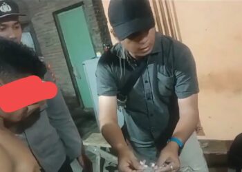 Tersangka Rikcan Muliadi Damanik saat ditangkap