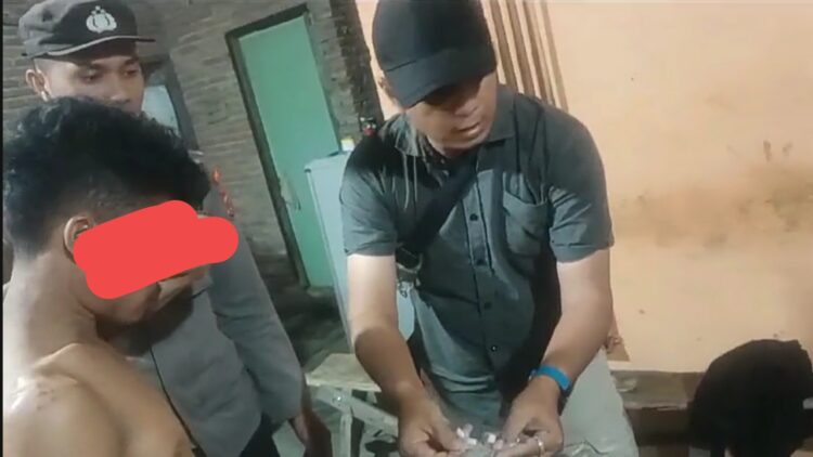 Tersangka Rikcan Muliadi Damanik saat ditangkap
