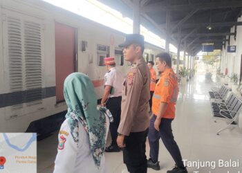 Polres Tanjung Balai Laksanakan Pengamanan di Pos Terpadu Stasiun Kereta Api
