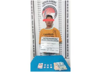 Tersangka RS alias Ranto beserta barang bukti