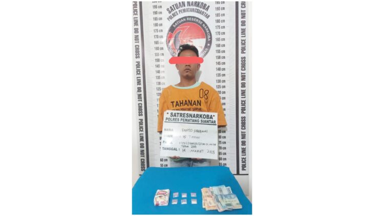 Tersangka RS alias Ranto beserta barang bukti